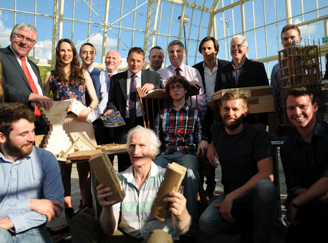 Minister Hayes (back left) presented prizes at the annual Third Level Student Wood Awards in the National Botanic Gardens. With Minister Hayes are some of he winning students, Duncan Stewart, Paul Harvey, chairman WMF and Gerard Murphy representing Coillte, the main sponsor of the awards.
